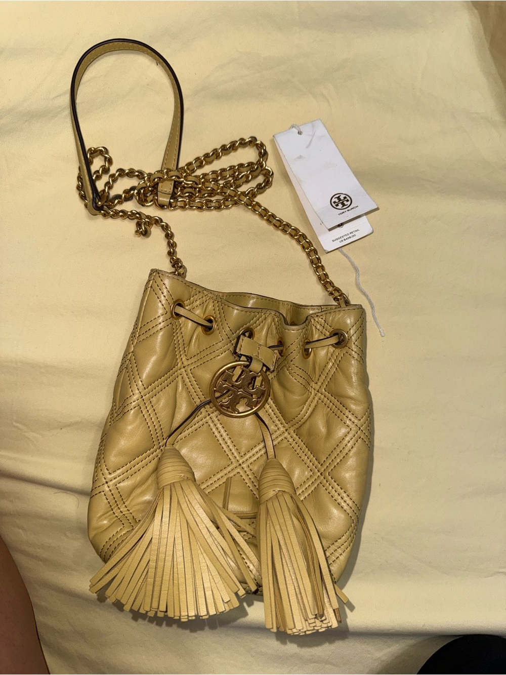Tory Burch Quilted Tassel Mini Bucket Bag in Light Yellow